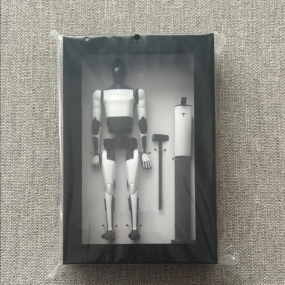 Tesla Black and White Robot Figure